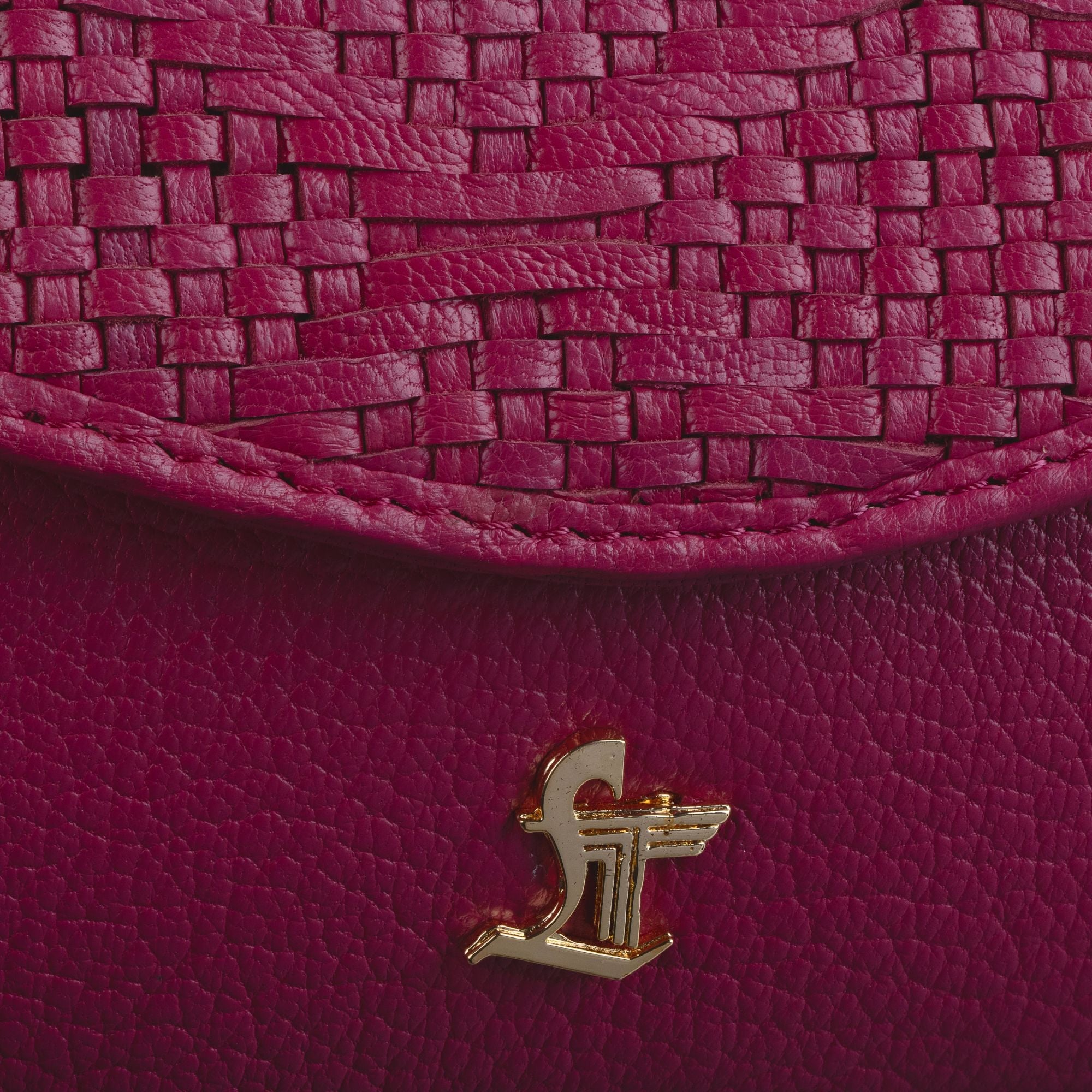 Leather Talks gold logo on genuine hand-woven leather flap – premium craftsmanship detail