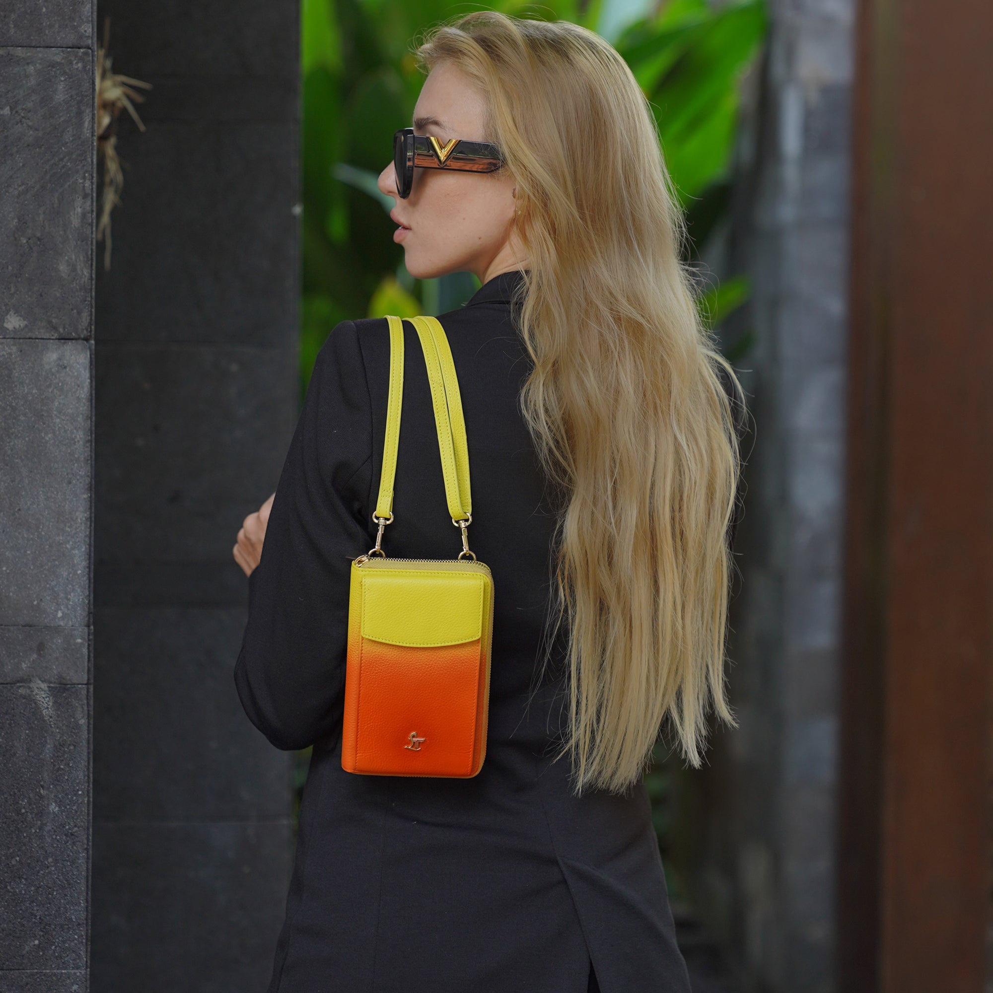 Close-up of a luxury leather sling bag for women, showcasing premium craftsmanship and sleek design.