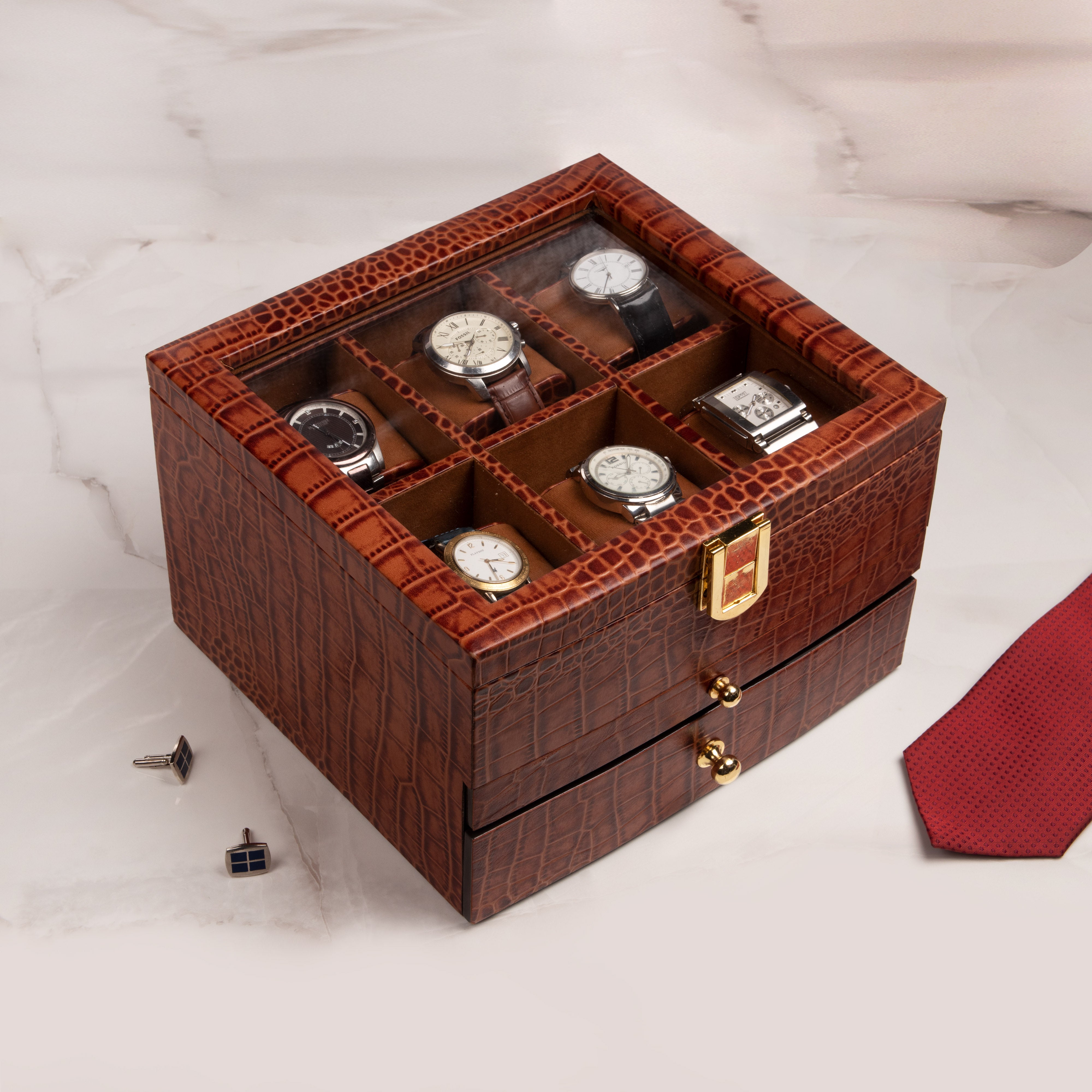 Luxury leather valet box for men featuring top watch section, middle pen slot, and bottom tray for wallet and accessories.