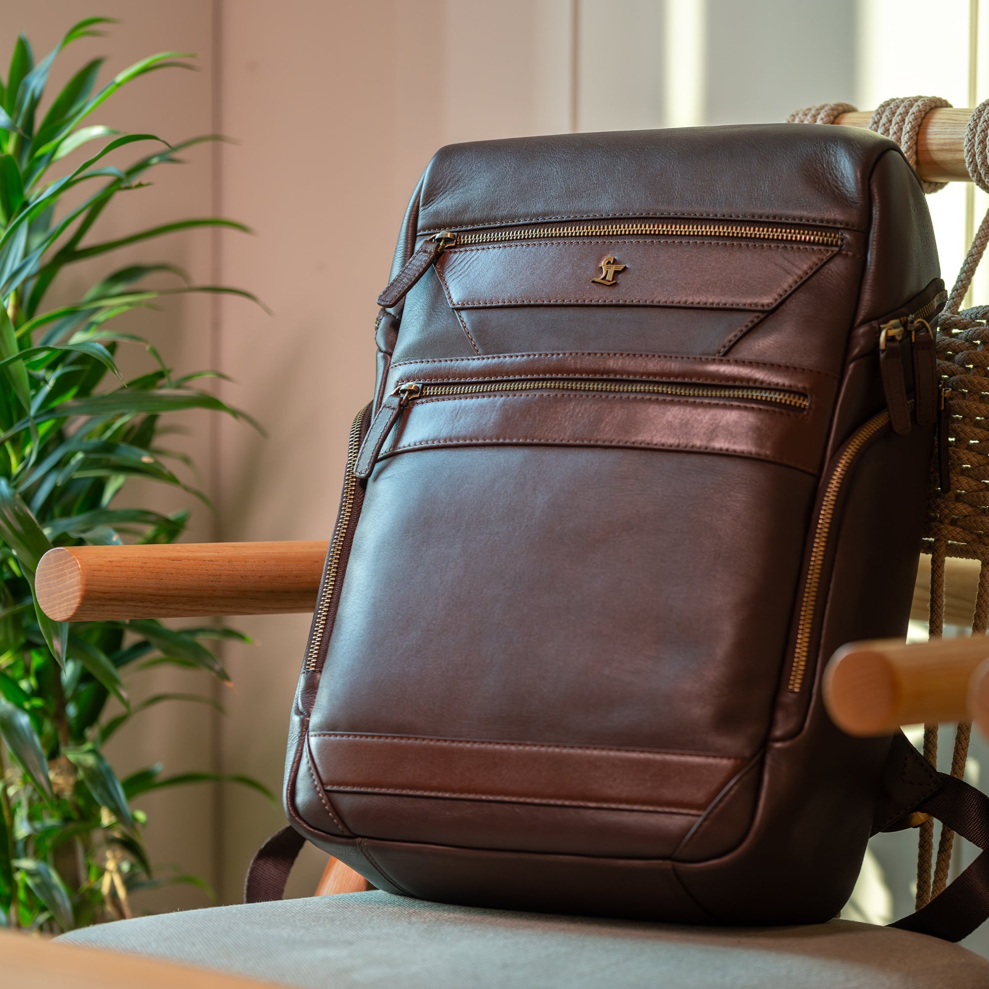 Luxury leather laptop backpack for men, offering stylish and functional storage.