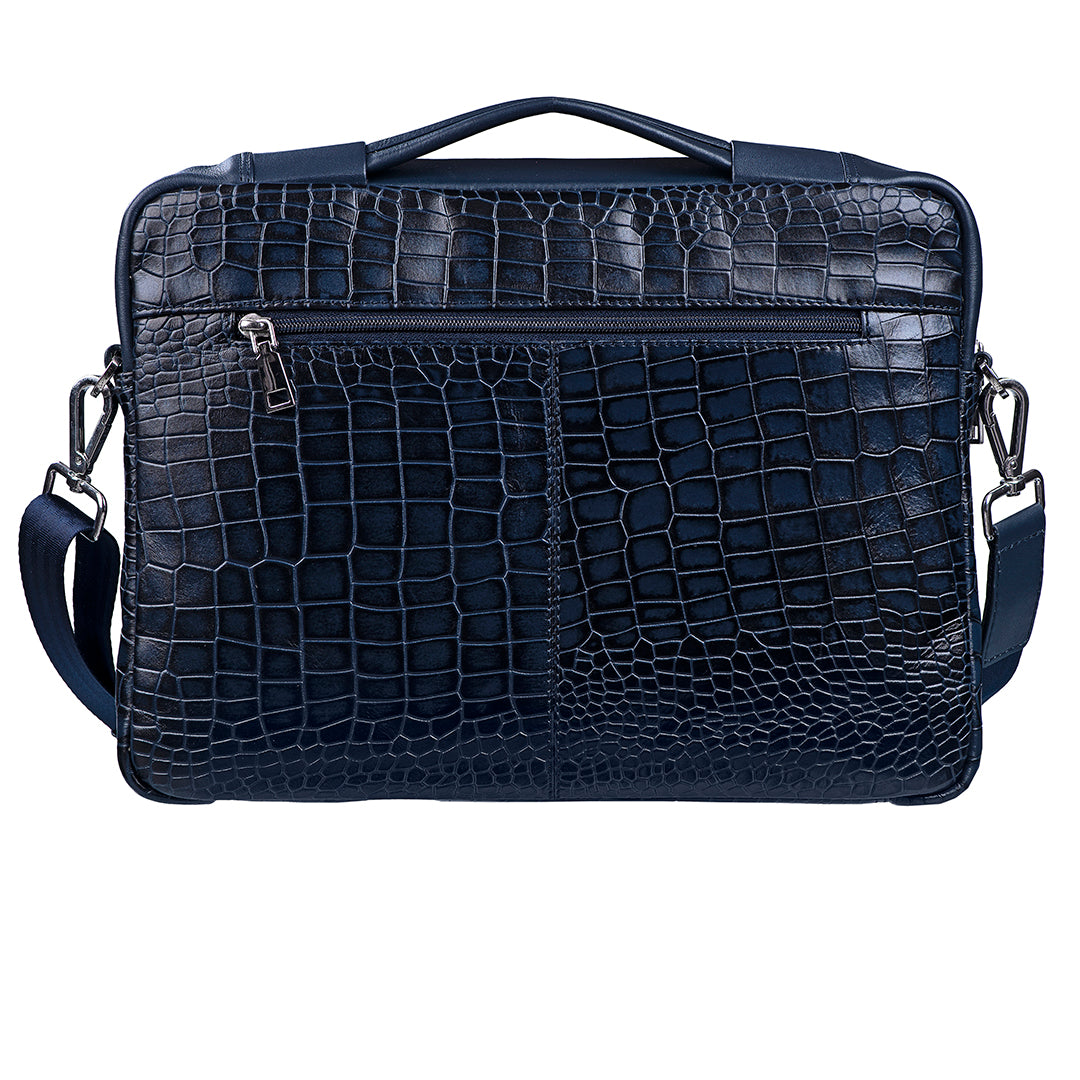 Backside view of leather laptop sleeve showing zip pocket and handle details